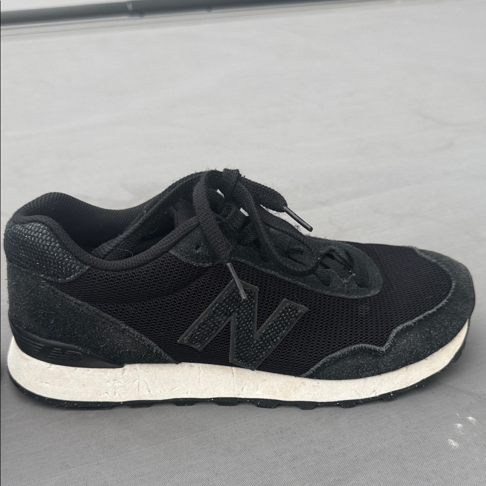 New Balance Black and White Athletic Shoes